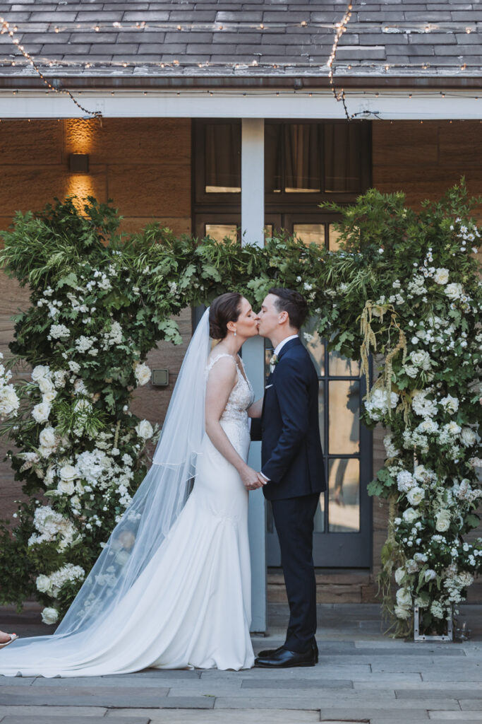 Bridal couple kissing