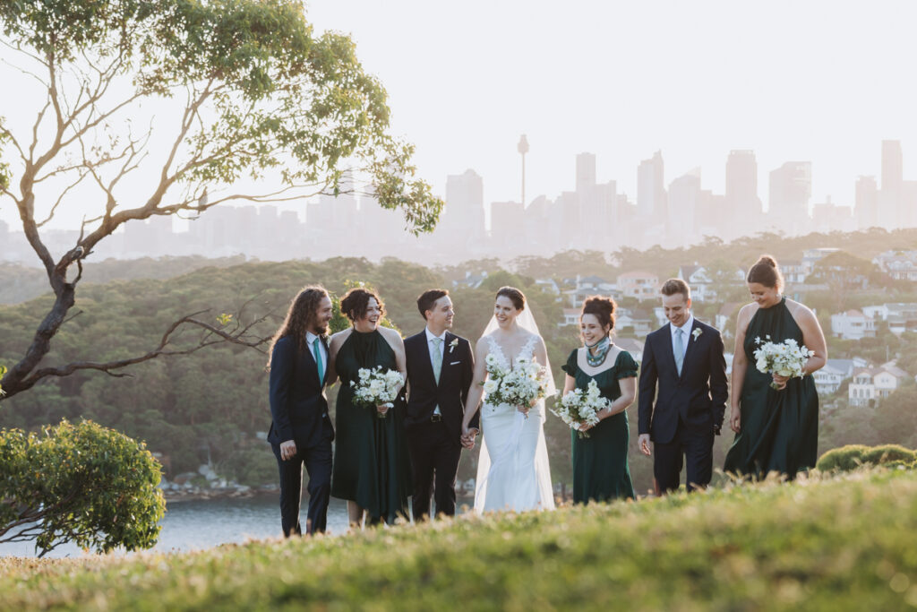Bridal party with city skyline in the background